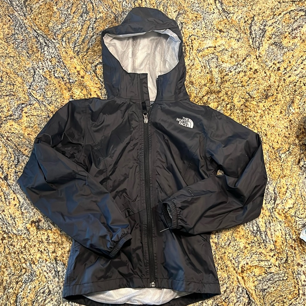 The North Face youth size 10-12 black tags removed never worn.